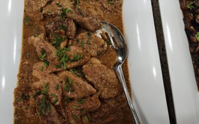 Seared Sliced Pork Tenderloin with Caramelized Onions and Gravy