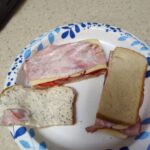 Basil Dill Mayonnaise on a ham and cheese sandwich with tomato