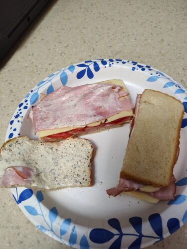 Basil Dill Mayonnaise on a ham and cheese sandwich with tomato