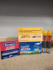 Pictured is Benadryl Liquid Gels, Claritin Reditabs, EPinephrine Injections boxes with 2 Injectors for Anaphylaxis